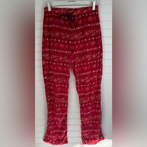 Rudolph the red nosed Reindeer, women’s red holiday pajama pants. Size XS 0-2.